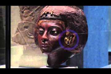 Portrait Head of Queen Tiye with a Crown of Two Feathers
